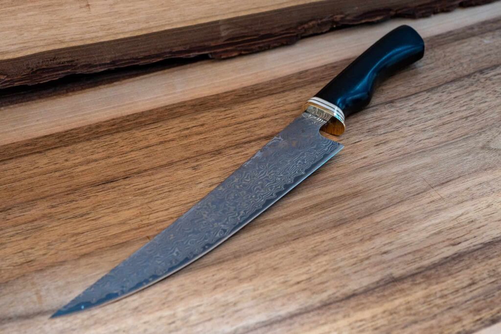 Kitchen knife — Damasc Ebony Wood & ivory