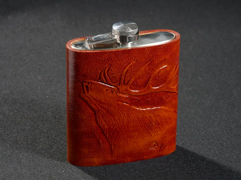 Metal pocket bottle covered in leather